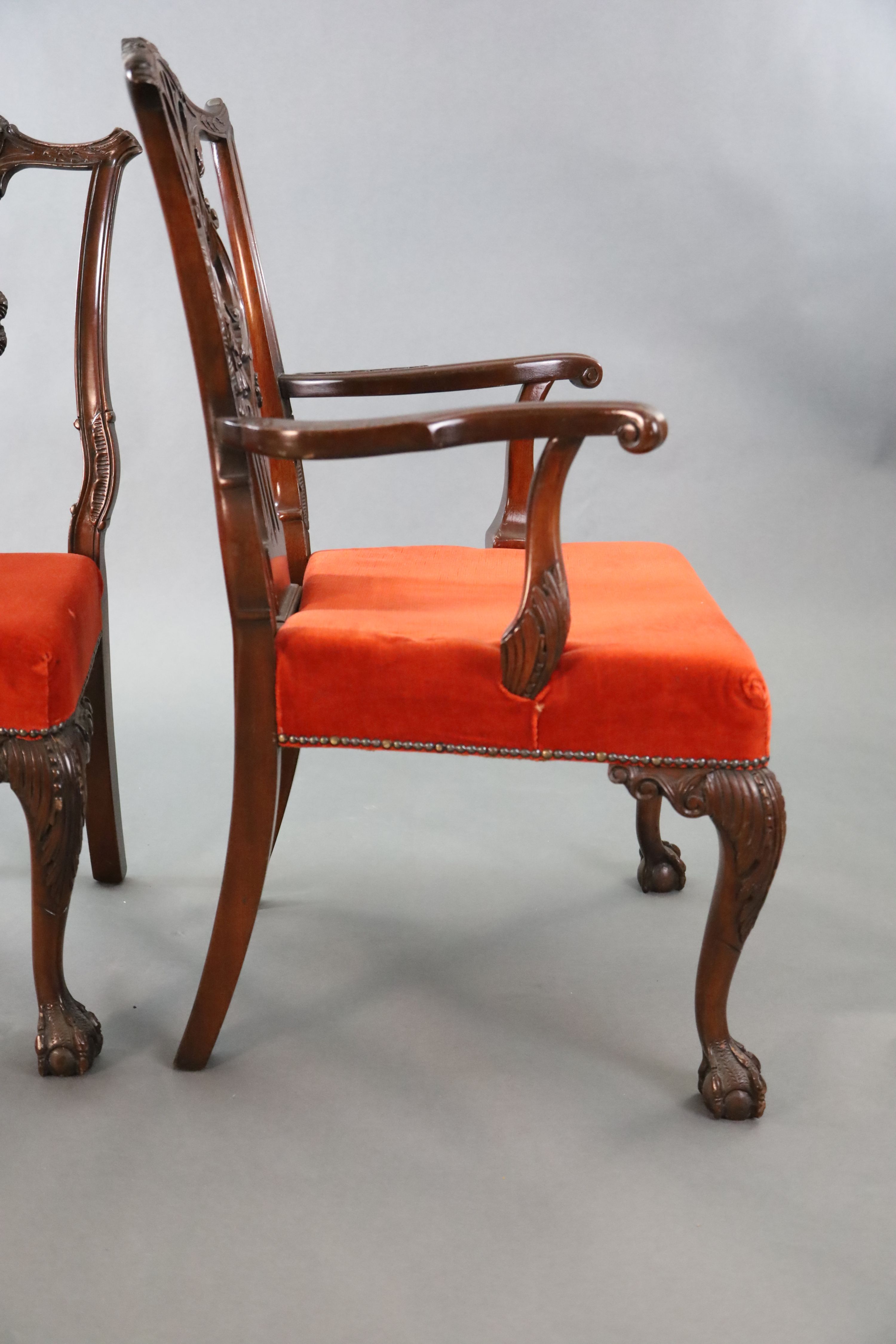 A set of eight Chippendale Revival mahogany dining chairs, carvers W.2ft D.2ft H.3ft 4in.